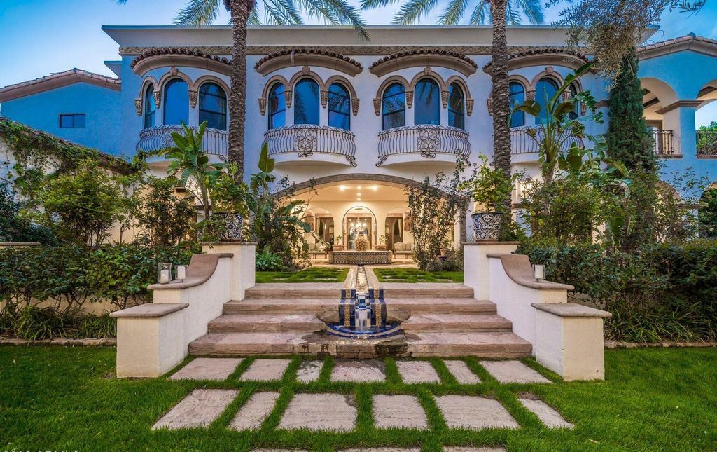 The Estate in Mesa, a an entertainer's dream designed for resort-like living with over 14,000 square feet of pure luxury offering a lush formally landscaped sanctuary and countless amenities is now available for sale. This home located at 1550 N 40th St UNIT 14, Mesa, Arizona