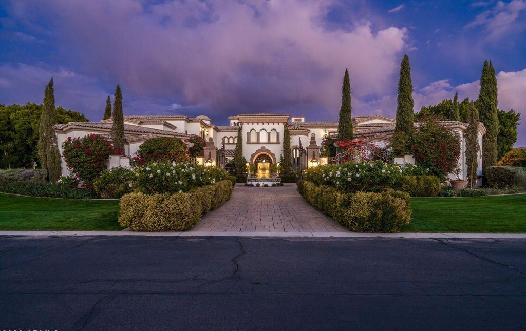 The Estate in Mesa, a an entertainer's dream designed for resort-like living with over 14,000 square feet of pure luxury offering a lush formally landscaped sanctuary and countless amenities is now available for sale. This home located at 1550 N 40th St UNIT 14, Mesa, Arizona