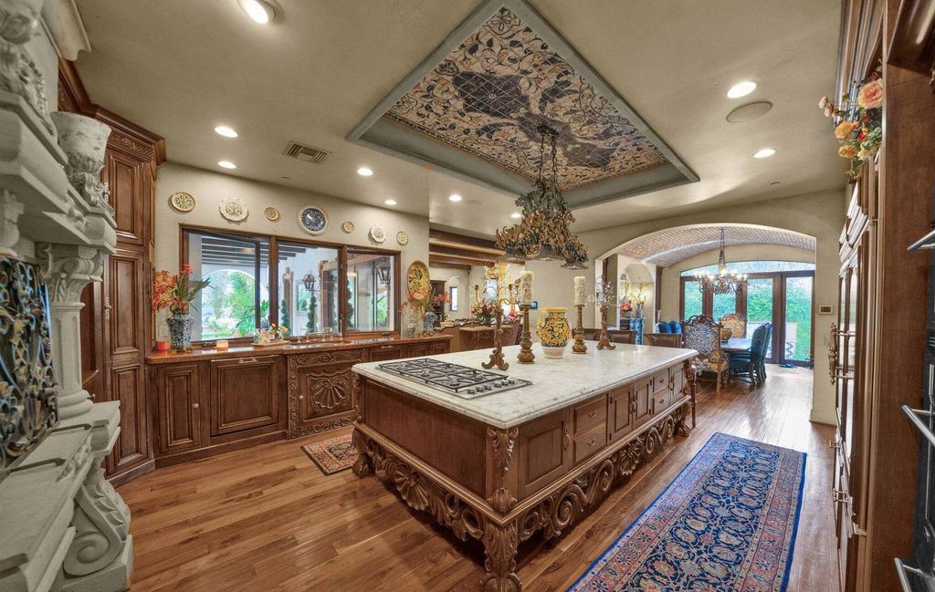 The Estate in Mesa, a an entertainer's dream designed for resort-like living with over 14,000 square feet of pure luxury offering a lush formally landscaped sanctuary and countless amenities is now available for sale. This home located at 1550 N 40th St UNIT 14, Mesa, Arizona