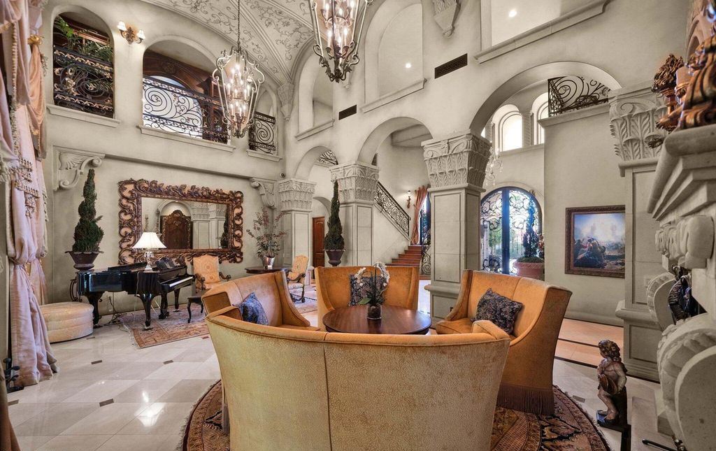 The Estate in Mesa, a an entertainer's dream designed for resort-like living with over 14,000 square feet of pure luxury offering a lush formally landscaped sanctuary and countless amenities is now available for sale. This home located at 1550 N 40th St UNIT 14, Mesa, Arizona