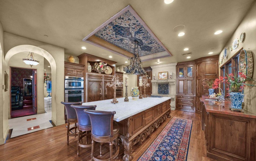 The Estate in Mesa, a an entertainer's dream designed for resort-like living with over 14,000 square feet of pure luxury offering a lush formally landscaped sanctuary and countless amenities is now available for sale. This home located at 1550 N 40th St UNIT 14, Mesa, Arizona