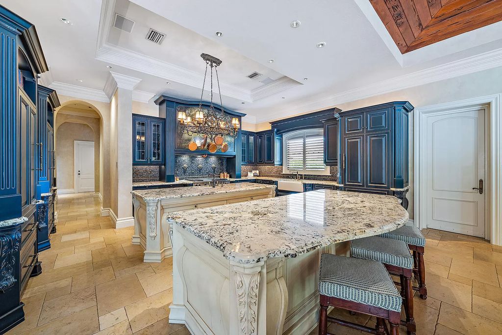 The Home in Palm Beach Gardens, a private custom estate on the largest homesite within Frenchman's Reserve offering luxurious amenities for both living and entertaining is now available for sale. This home located at 667 Hermitage Cir, Palm Beach Gardens, Florida