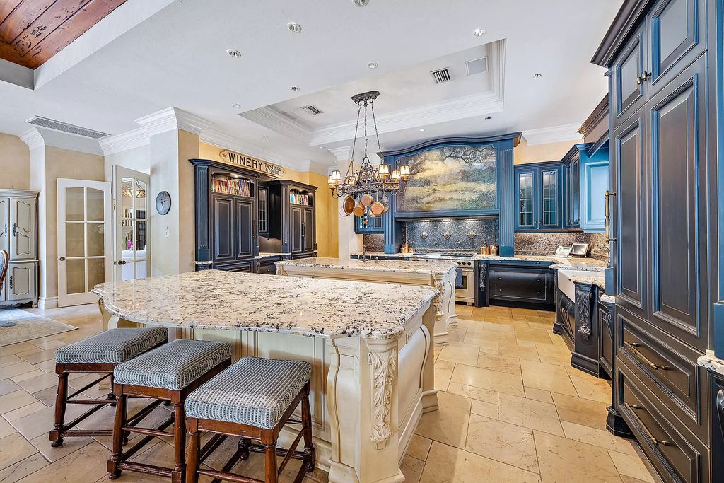 The Home in Palm Beach Gardens, a private custom estate on the largest homesite within Frenchman's Reserve offering luxurious amenities for both living and entertaining is now available for sale. This home located at 667 Hermitage Cir, Palm Beach Gardens, Florida