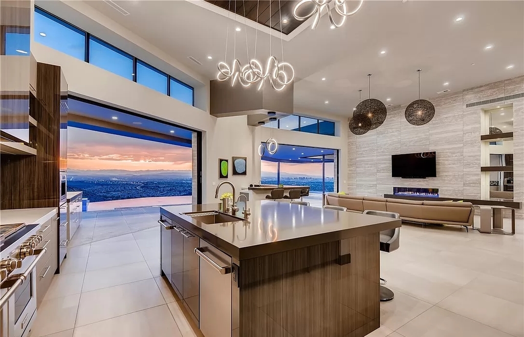 The Home in Henderson, a beautiful estate has a special exclusive view of the famous “Dragon’s Back” in MacDonald Highlands offering a completely comfortable and tranquil atmosphere is now available for sale. This home located at 665 Dragon Peak Dr, Henderson, Nevada
