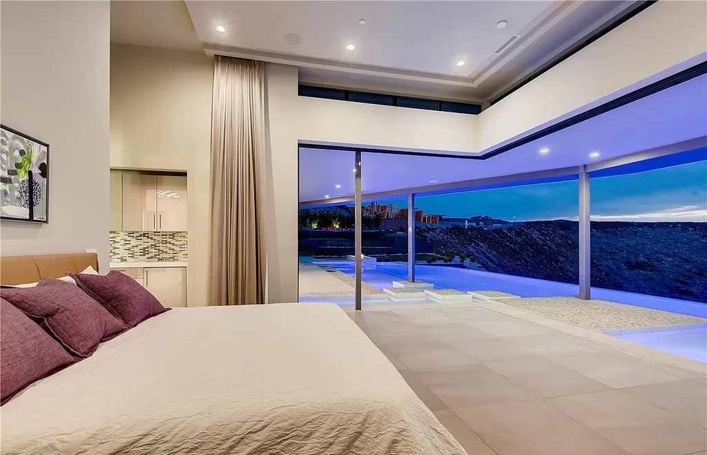 The Home in Henderson, a beautiful estate has a special exclusive view of the famous “Dragon’s Back” in MacDonald Highlands offering a completely comfortable and tranquil atmosphere is now available for sale. This home located at 665 Dragon Peak Dr, Henderson, Nevada