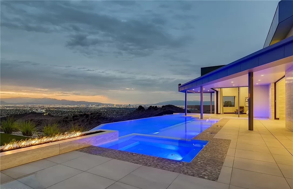 The Home in Henderson, a beautiful estate has a special exclusive view of the famous “Dragon’s Back” in MacDonald Highlands offering a completely comfortable and tranquil atmosphere is now available for sale. This home located at 665 Dragon Peak Dr, Henderson, Nevada