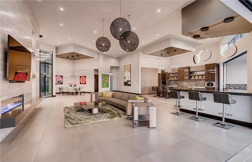 The Home in Henderson, a beautiful estate has a special exclusive view of the famous “Dragon’s Back” in MacDonald Highlands offering a completely comfortable and tranquil atmosphere is now available for sale. This home located at 665 Dragon Peak Dr, Henderson, Nevada