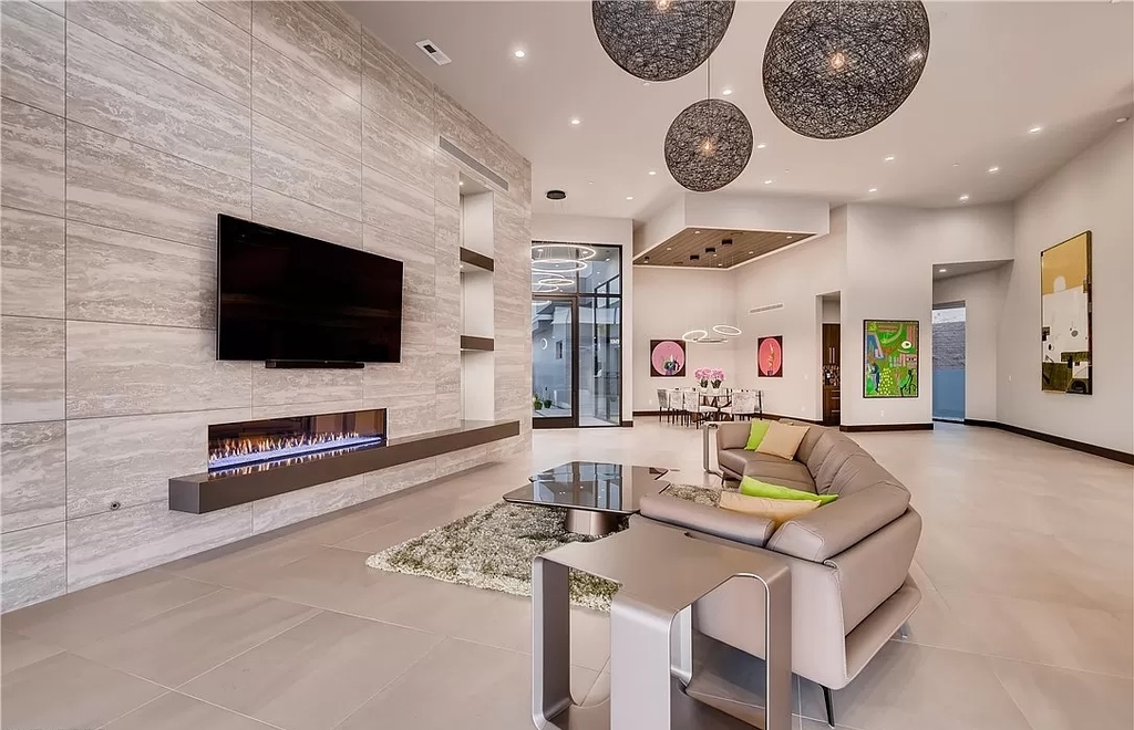 The Home in Henderson, a beautiful estate has a special exclusive view of the famous “Dragon’s Back” in MacDonald Highlands offering a completely comfortable and tranquil atmosphere is now available for sale. This home located at 665 Dragon Peak Dr, Henderson, Nevada