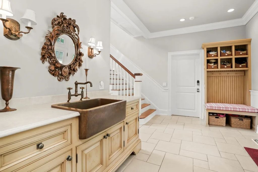 The Manor in Greenwich offers beautiful infinity pool and spa with a pool house, indoor and outdoor showers and outdoor kitchen, now available for sale. This home located at 59 Mooreland Rd, Greenwich, Connecticut