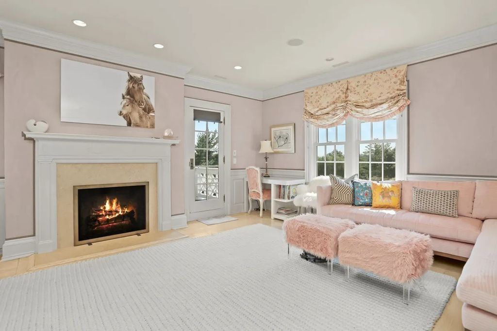 The Manor in Greenwich offers beautiful infinity pool and spa with a pool house, indoor and outdoor showers and outdoor kitchen, now available for sale. This home located at 59 Mooreland Rd, Greenwich, Connecticut
