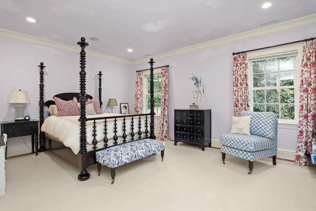 The Manor in Greenwich offers beautiful infinity pool and spa with a pool house, indoor and outdoor showers and outdoor kitchen, now available for sale. This home located at 59 Mooreland Rd, Greenwich, Connecticut