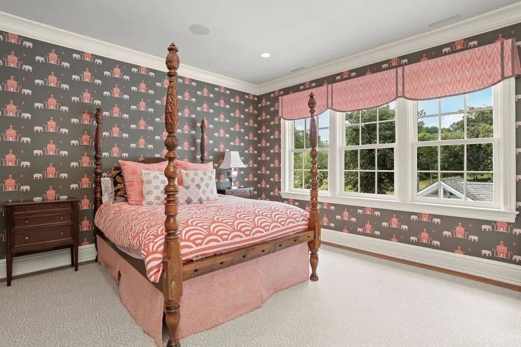 The Manor in Greenwich offers beautiful infinity pool and spa with a pool house, indoor and outdoor showers and outdoor kitchen, now available for sale. This home located at 59 Mooreland Rd, Greenwich, Connecticut