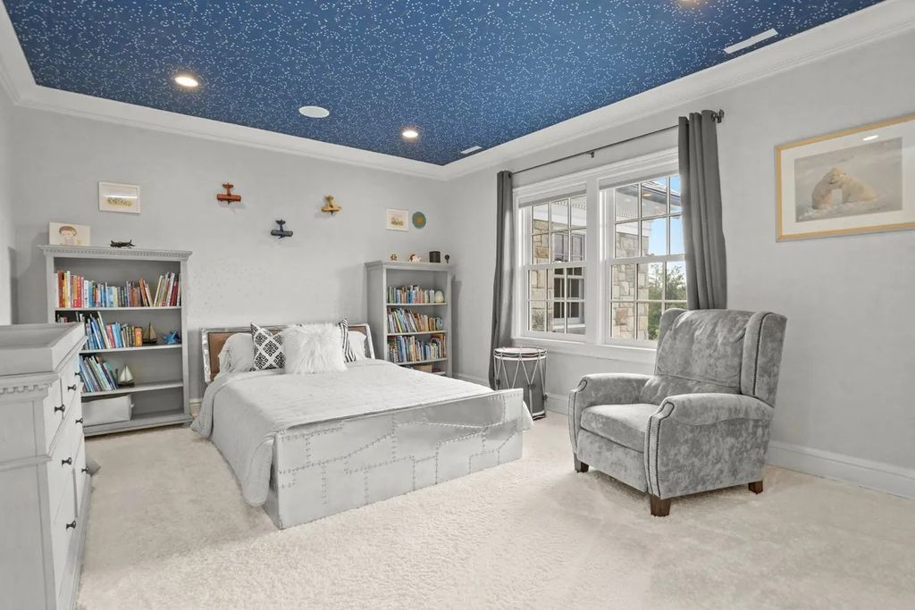 The Manor in Greenwich offers beautiful infinity pool and spa with a pool house, indoor and outdoor showers and outdoor kitchen, now available for sale. This home located at 59 Mooreland Rd, Greenwich, Connecticut