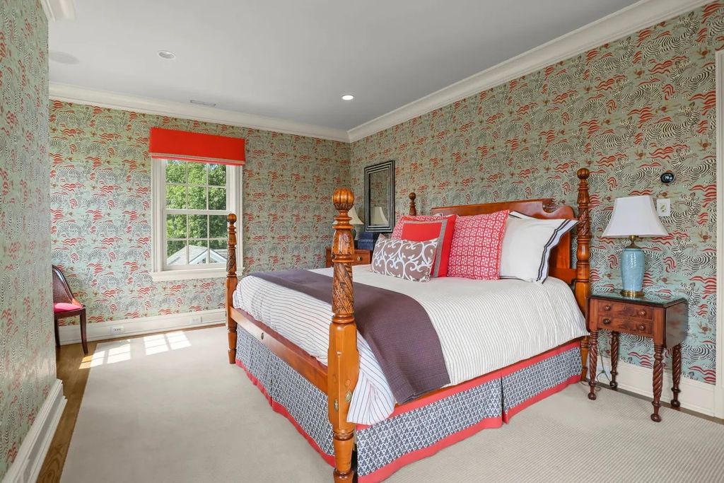 The Manor in Greenwich offers beautiful infinity pool and spa with a pool house, indoor and outdoor showers and outdoor kitchen, now available for sale. This home located at 59 Mooreland Rd, Greenwich, Connecticut