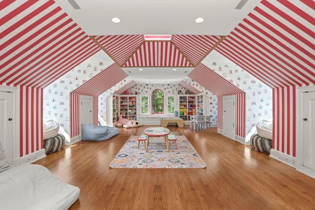 The Manor in Greenwich offers beautiful infinity pool and spa with a pool house, indoor and outdoor showers and outdoor kitchen, now available for sale. This home located at 59 Mooreland Rd, Greenwich, Connecticut