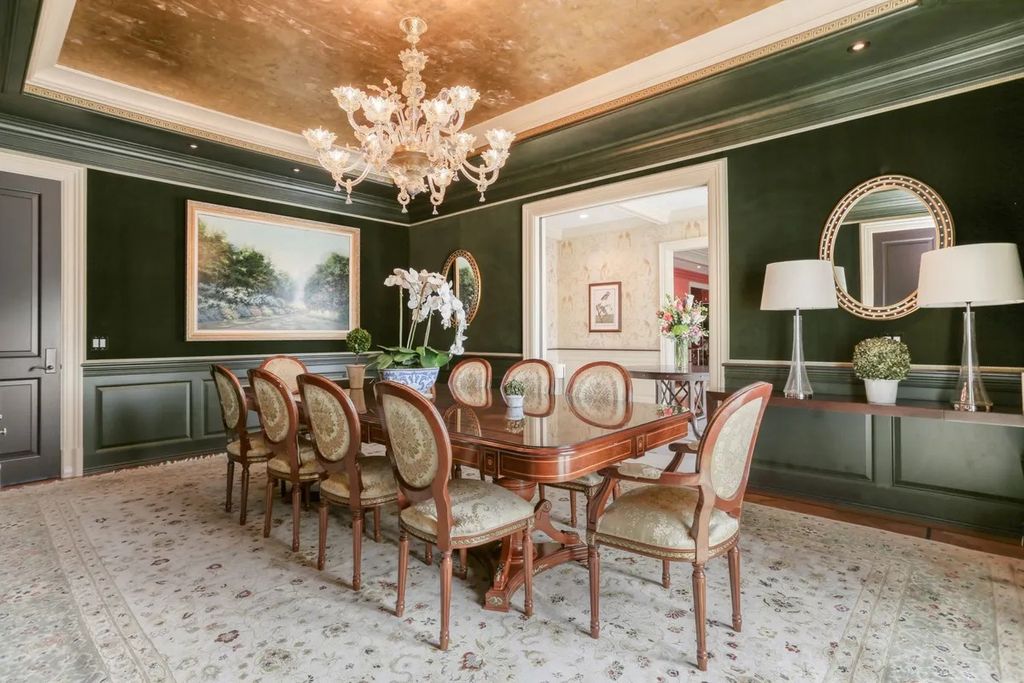 The Manor in Greenwich offers beautiful infinity pool and spa with a pool house, indoor and outdoor showers and outdoor kitchen, now available for sale. This home located at 59 Mooreland Rd, Greenwich, Connecticut