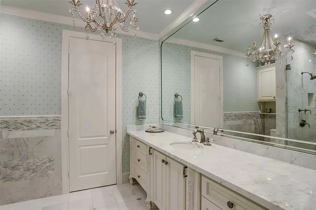 The Mansion in Tomball, a timeless estate with French style and old world charm featuring unique architectural design, attention to detail and the exceptional quality of materials is now available for sale. This home located at 36 Saddlebrook Ct, Tomball, Texas