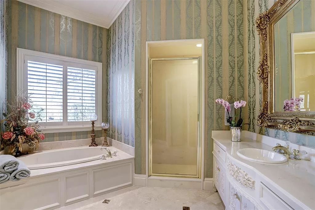 The Mansion in Tomball, a timeless estate with French style and old world charm featuring unique architectural design, attention to detail and the exceptional quality of materials is now available for sale. This home located at 36 Saddlebrook Ct, Tomball, Texas