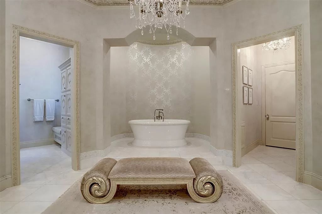 The Mansion in Tomball, a timeless estate with French style and old world charm featuring unique architectural design, attention to detail and the exceptional quality of materials is now available for sale. This home located at 36 Saddlebrook Ct, Tomball, Texas