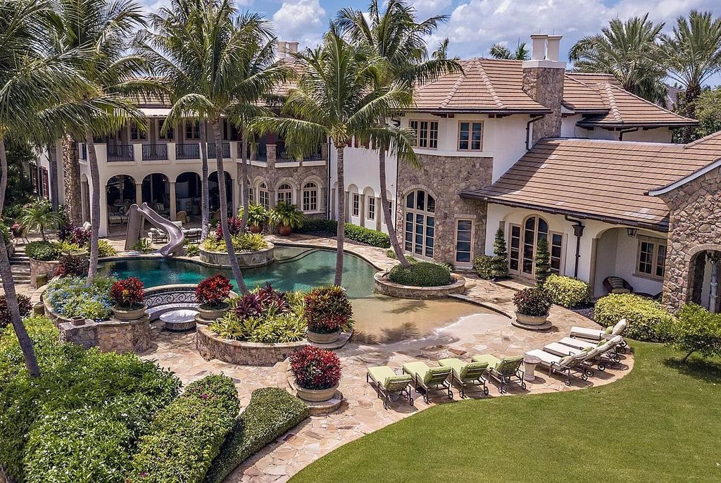 The Mansion in Boca Raton, one of the most celebrated estates in the Royal Palm Yacht & County Club encompasses luxurious living with stunning flagstone terraces, a resort-style pool, and grand entertainment loggia is now available for sale. This home located at 200 W Coconut Palm Rd, Boca Raton, Florida