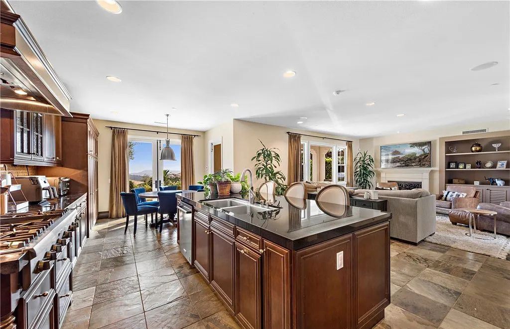 The Home in San Clemente, a beautifully upgraded residence offers panoramic ocean, valley, hill and city-light views from indoor and outdoor living areas is now available for sale. This home located at 18 Via Alcamo, San Clemente, California