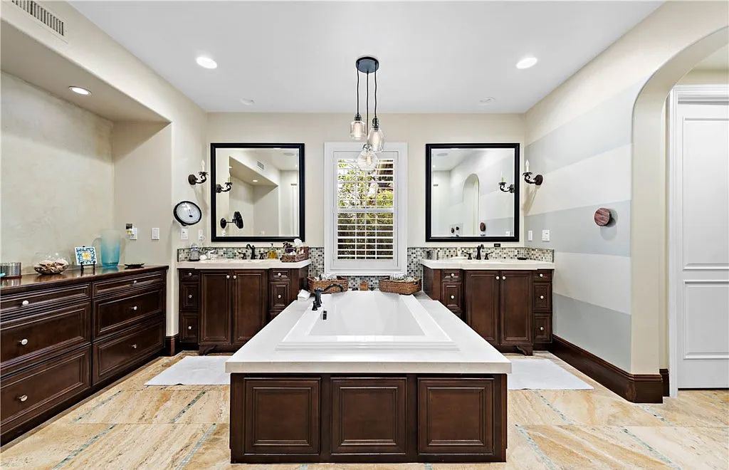 The Home in San Clemente, a beautifully upgraded residence offers panoramic ocean, valley, hill and city-light views from indoor and outdoor living areas is now available for sale. This home located at 18 Via Alcamo, San Clemente, California