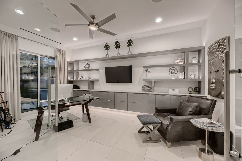 The Home in Henderson, a MacDonald Highlands residence offers a bright and open floor plan, an amazing backyard with infinity edge pool, spa, outdoor kitchen with bbq, fire pit and lounge area is now available for sale. This home located at 667 Palisade Rim Dr, Henderson, Nevada