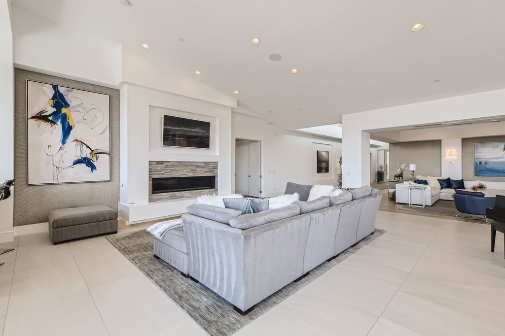 The Home in Henderson, a MacDonald Highlands residence offers a bright and open floor plan, an amazing backyard with infinity edge pool, spa, outdoor kitchen with bbq, fire pit and lounge area is now available for sale. This home located at 667 Palisade Rim Dr, Henderson, Nevada
