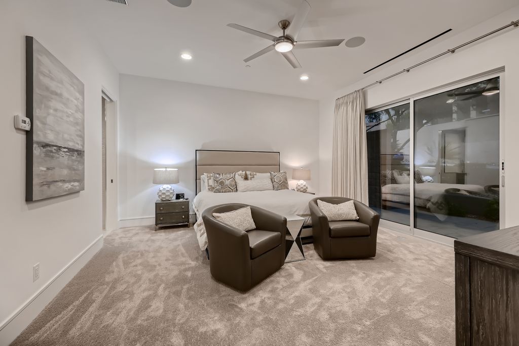 The Home in Henderson, a MacDonald Highlands residence offers a bright and open floor plan, an amazing backyard with infinity edge pool, spa, outdoor kitchen with bbq, fire pit and lounge area is now available for sale. This home located at 667 Palisade Rim Dr, Henderson, Nevada