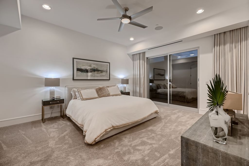 The Home in Henderson, a MacDonald Highlands residence offers a bright and open floor plan, an amazing backyard with infinity edge pool, spa, outdoor kitchen with bbq, fire pit and lounge area is now available for sale. This home located at 667 Palisade Rim Dr, Henderson, Nevada