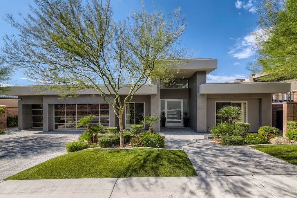 The Home in Henderson, a MacDonald Highlands residence offers a bright and open floor plan, an amazing backyard with infinity edge pool, spa, outdoor kitchen with bbq, fire pit and lounge area is now available for sale. This home located at 667 Palisade Rim Dr, Henderson, Nevada