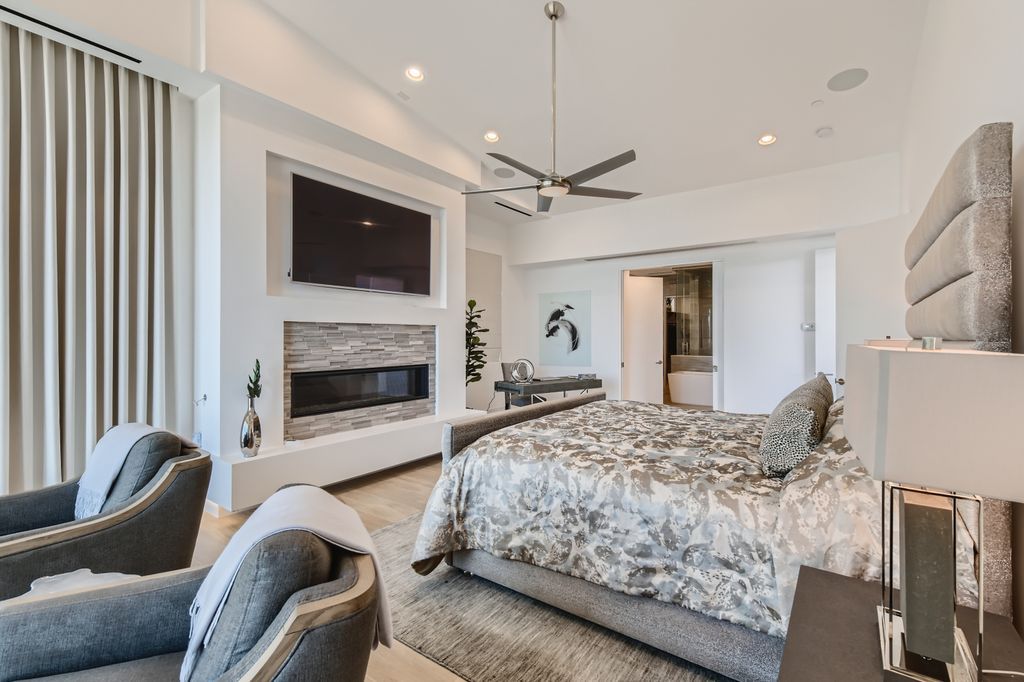 The Home in Henderson, a MacDonald Highlands residence offers a bright and open floor plan, an amazing backyard with infinity edge pool, spa, outdoor kitchen with bbq, fire pit and lounge area is now available for sale. This home located at 667 Palisade Rim Dr, Henderson, Nevada