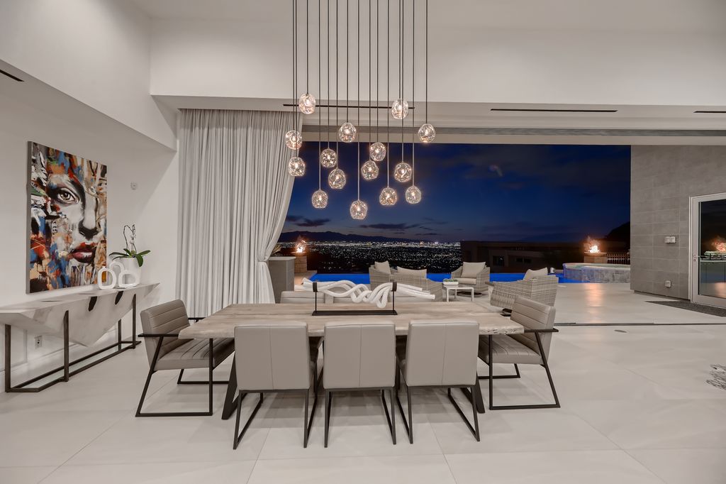 The Home in Henderson, a MacDonald Highlands residence offers a bright and open floor plan, an amazing backyard with infinity edge pool, spa, outdoor kitchen with bbq, fire pit and lounge area is now available for sale. This home located at 667 Palisade Rim Dr, Henderson, Nevada