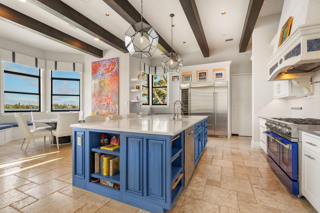 7350 Captain Kidd Ave, Sarasota, Florida is an amazing bay front estate accentuates a light and bright designer open floor plan which effortlessly blends architectural character with a modern look.