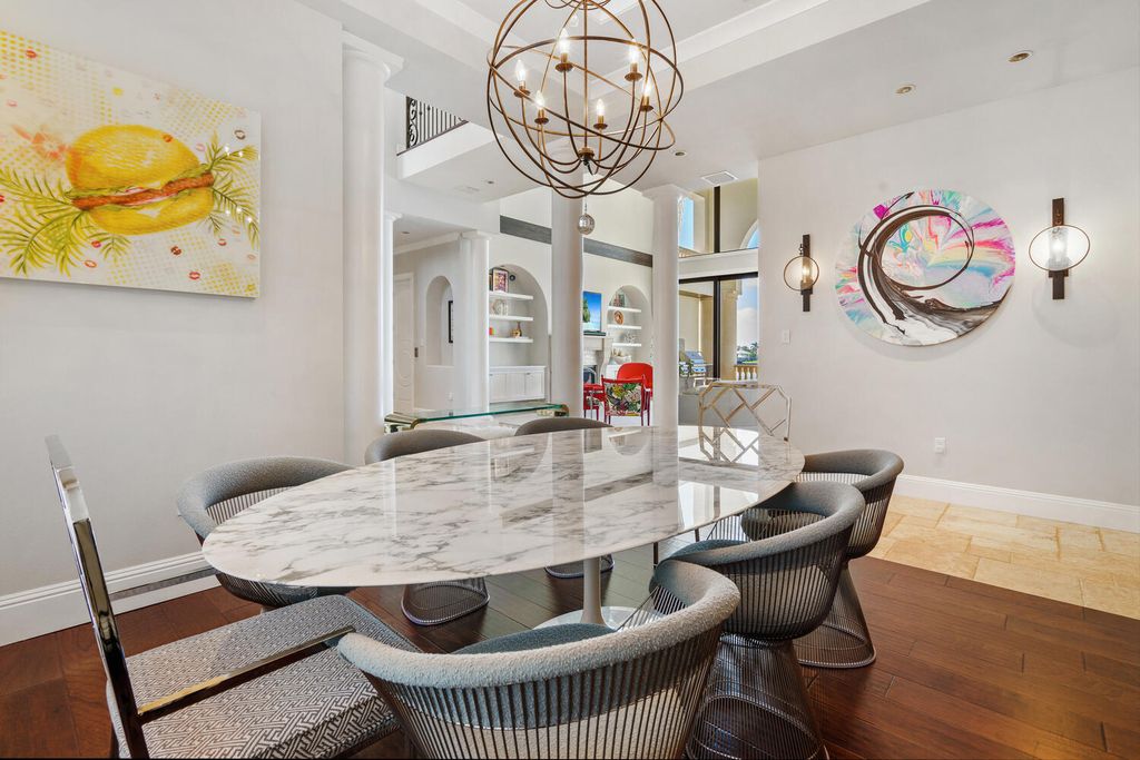7350 Captain Kidd Ave, Sarasota, Florida is an amazing bay front estate accentuates a light and bright designer open floor plan which effortlessly blends architectural character with a modern look.