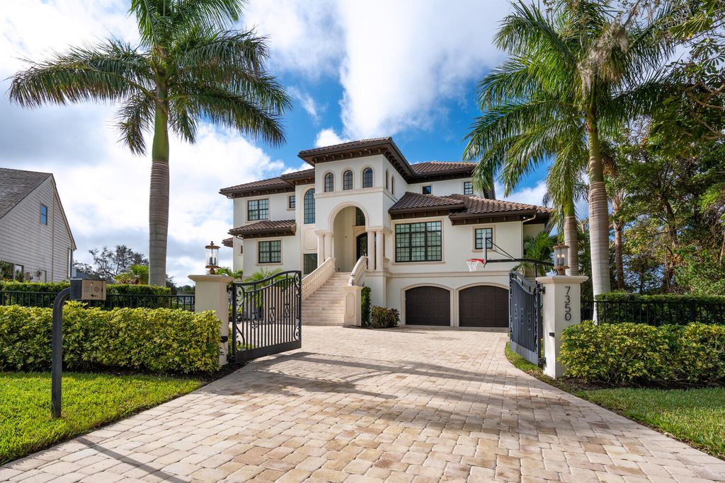 7350 Captain Kidd Ave, Sarasota, Florida is an amazing bay front estate accentuates a light and bright designer open floor plan which effortlessly blends architectural character with a modern look.