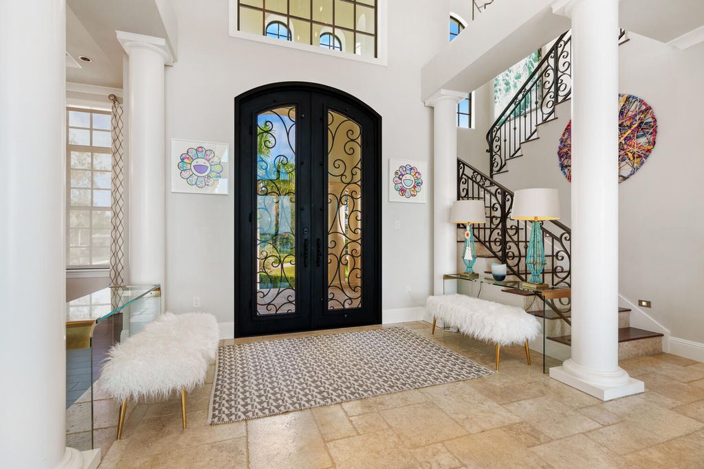 7350 Captain Kidd Ave, Sarasota, Florida is an amazing bay front estate accentuates a light and bright designer open floor plan which effortlessly blends architectural character with a modern look.
