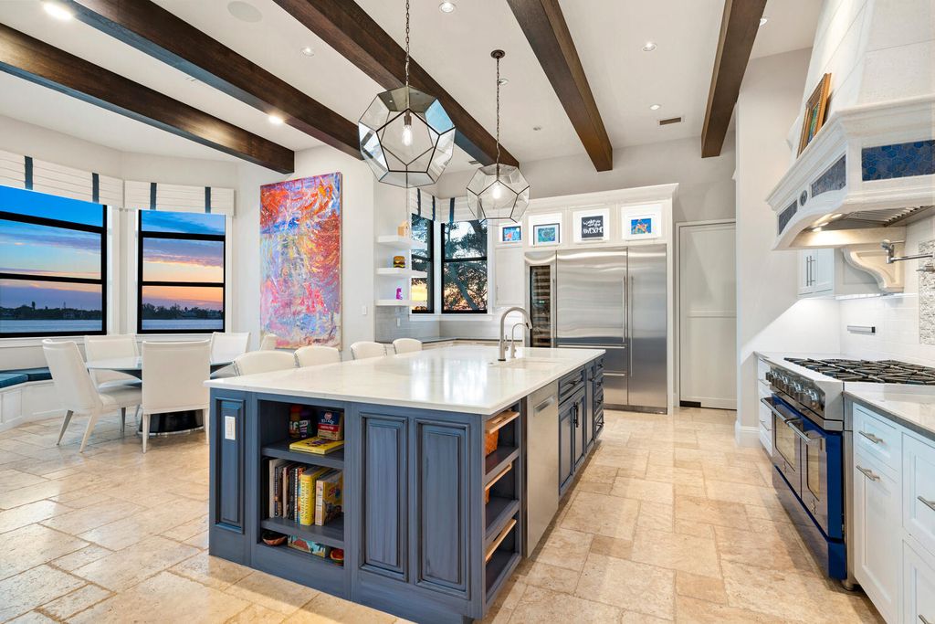 7350 Captain Kidd Ave, Sarasota, Florida is an amazing bay front estate accentuates a light and bright designer open floor plan which effortlessly blends architectural character with a modern look.