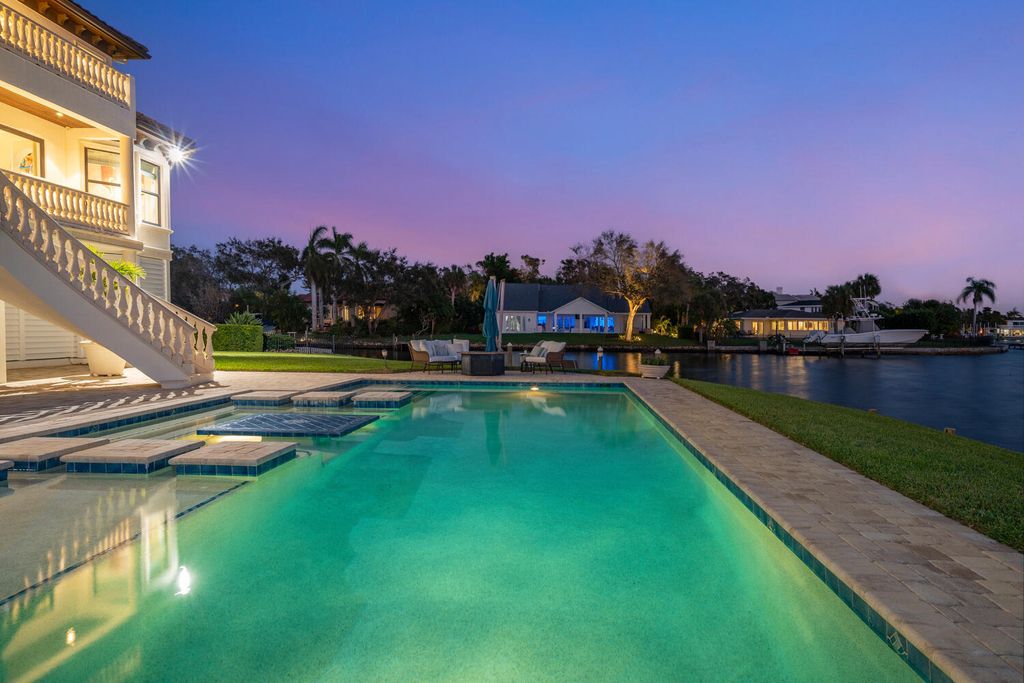 7350 Captain Kidd Ave, Sarasota, Florida is an amazing bay front estate accentuates a light and bright designer open floor plan which effortlessly blends architectural character with a modern look.