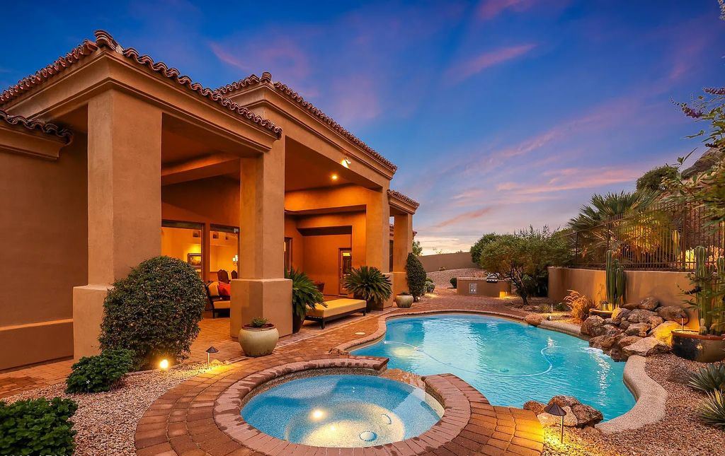 The Home in Scottsdale, a custom estate sitting on 2.78 acres in gated Sonoran Crest with details including box-beam, coffered and groin vault ceiling details, travertine stone flooring, granite counter surfaces, richly stained wood doors, trim, and cabinetry, a split floor plan and so much more is now available for sale. This home located at 24375 N 121st Pl, Scottsdale, Arizona