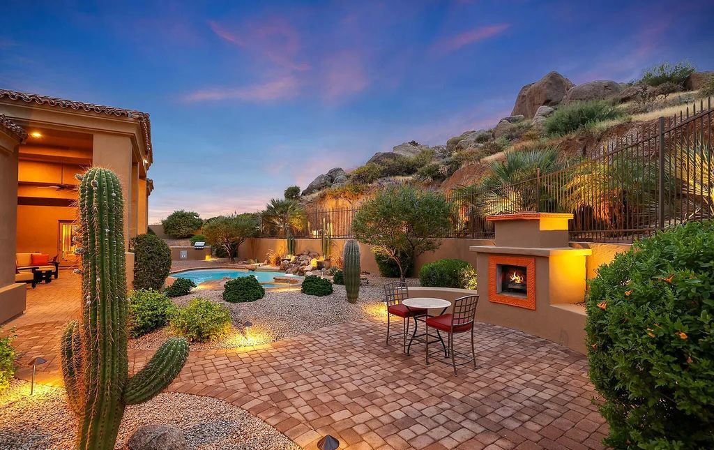 The Home in Scottsdale, a custom estate sitting on 2.78 acres in gated Sonoran Crest with details including box-beam, coffered and groin vault ceiling details, travertine stone flooring, granite counter surfaces, richly stained wood doors, trim, and cabinetry, a split floor plan and so much more is now available for sale. This home located at 24375 N 121st Pl, Scottsdale, Arizona