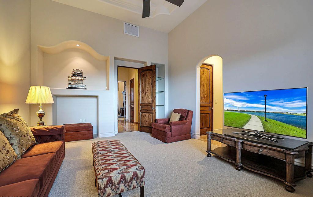 The Home in Scottsdale, a custom estate sitting on 2.78 acres in gated Sonoran Crest with details including box-beam, coffered and groin vault ceiling details, travertine stone flooring, granite counter surfaces, richly stained wood doors, trim, and cabinetry, a split floor plan and so much more is now available for sale. This home located at 24375 N 121st Pl, Scottsdale, Arizona