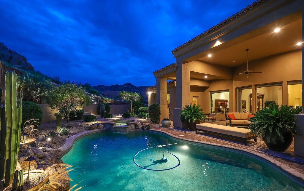 The Home in Scottsdale, a custom estate sitting on 2.78 acres in gated Sonoran Crest with details including box-beam, coffered and groin vault ceiling details, travertine stone flooring, granite counter surfaces, richly stained wood doors, trim, and cabinetry, a split floor plan and so much more is now available for sale. This home located at 24375 N 121st Pl, Scottsdale, Arizona