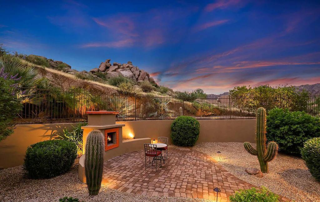 The Home in Scottsdale, a custom estate sitting on 2.78 acres in gated Sonoran Crest with details including box-beam, coffered and groin vault ceiling details, travertine stone flooring, granite counter surfaces, richly stained wood doors, trim, and cabinetry, a split floor plan and so much more is now available for sale. This home located at 24375 N 121st Pl, Scottsdale, Arizona