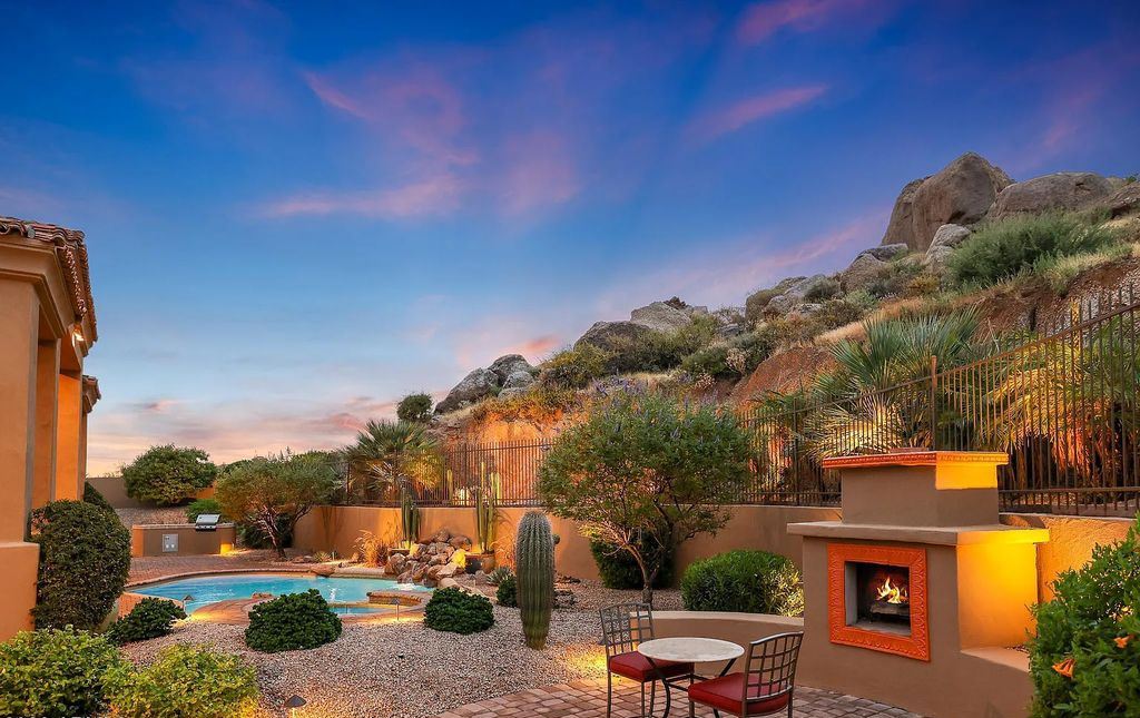 The Home in Scottsdale, a custom estate sitting on 2.78 acres in gated Sonoran Crest with details including box-beam, coffered and groin vault ceiling details, travertine stone flooring, granite counter surfaces, richly stained wood doors, trim, and cabinetry, a split floor plan and so much more is now available for sale. This home located at 24375 N 121st Pl, Scottsdale, Arizona