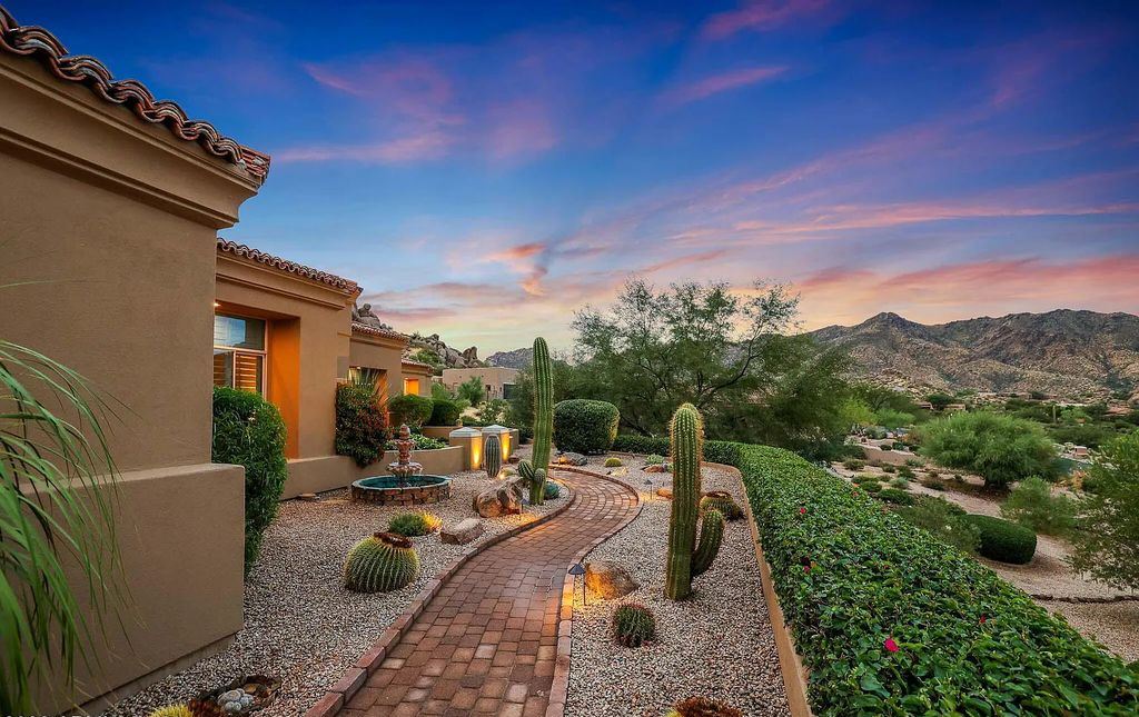 The Home in Scottsdale, a custom estate sitting on 2.78 acres in gated Sonoran Crest with details including box-beam, coffered and groin vault ceiling details, travertine stone flooring, granite counter surfaces, richly stained wood doors, trim, and cabinetry, a split floor plan and so much more is now available for sale. This home located at 24375 N 121st Pl, Scottsdale, Arizona