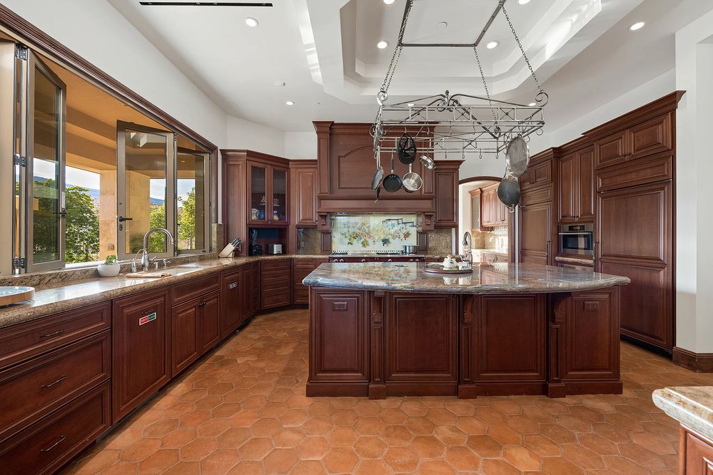 The Home in Las Vegas, an entertainer's dream at the end of a cul-de-sac with unobstructed mountain views boasting large, bright rooms, pocketing doors and windows as well as an abundance of natural light is now available for sale. This home located at 15 Bright Hollow Ct, Las Vegas, Nevada