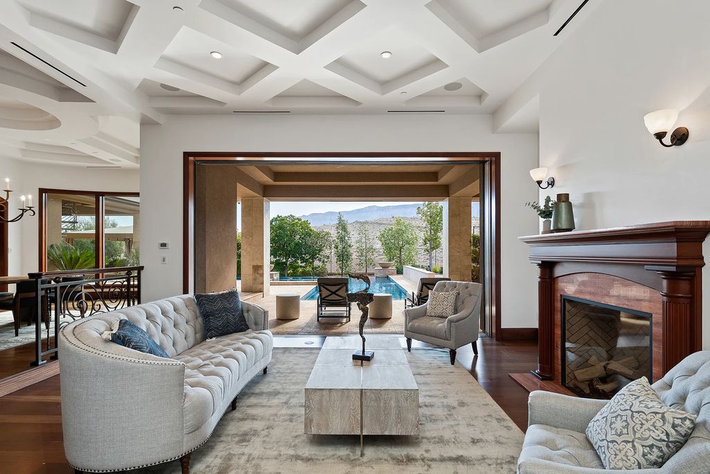 The Home in Las Vegas, an entertainer's dream at the end of a cul-de-sac with unobstructed mountain views boasting large, bright rooms, pocketing doors and windows as well as an abundance of natural light is now available for sale. This home located at 15 Bright Hollow Ct, Las Vegas, Nevada