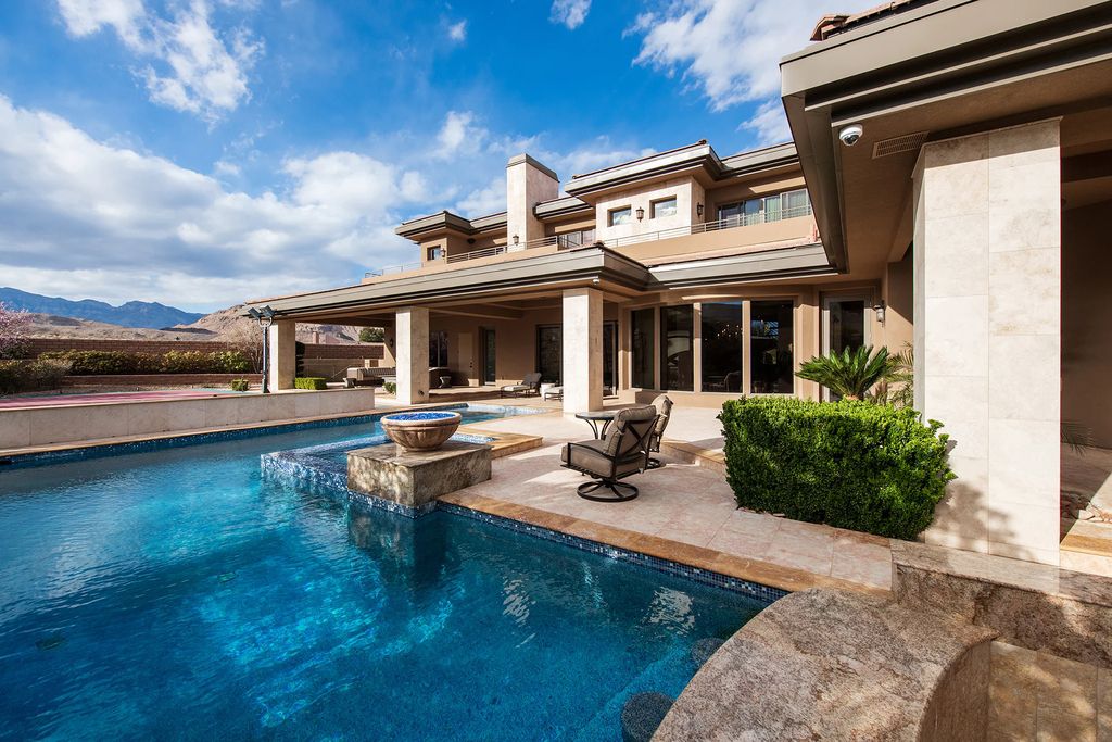 The Home in Las Vegas, an entertainer's dream at the end of a cul-de-sac with unobstructed mountain views boasting large, bright rooms, pocketing doors and windows as well as an abundance of natural light is now available for sale. This home located at 15 Bright Hollow Ct, Las Vegas, Nevada