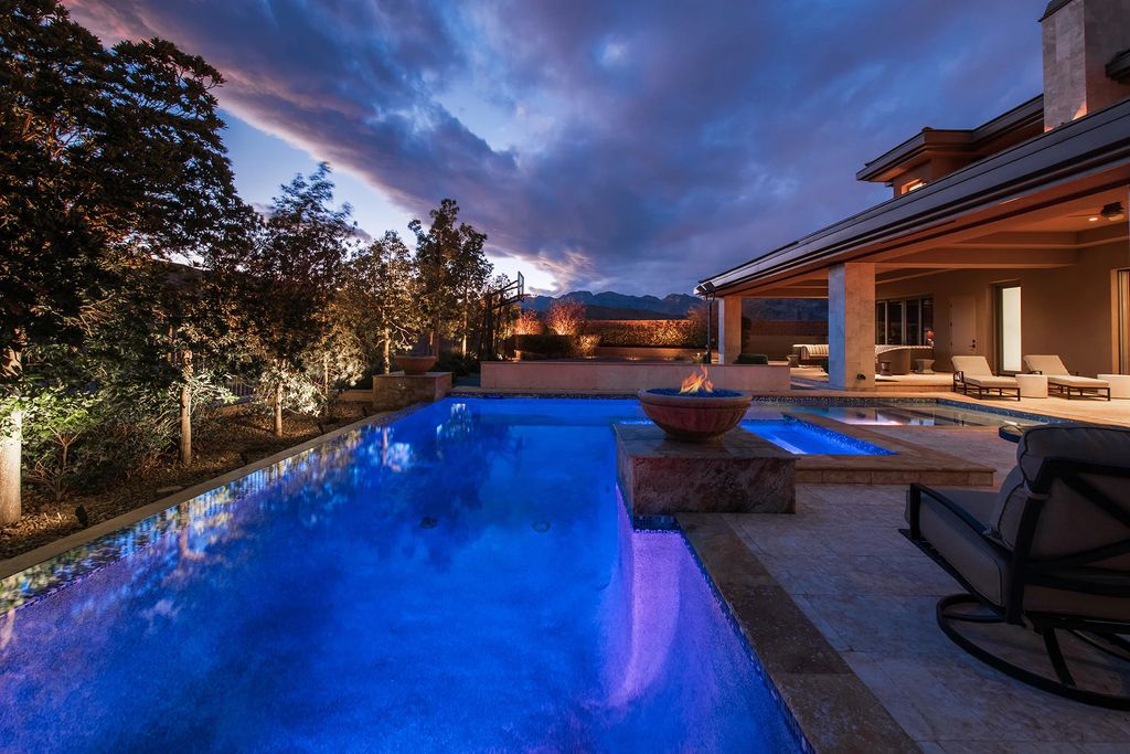 The Home in Las Vegas, an entertainer's dream at the end of a cul-de-sac with unobstructed mountain views boasting large, bright rooms, pocketing doors and windows as well as an abundance of natural light is now available for sale. This home located at 15 Bright Hollow Ct, Las Vegas, Nevada